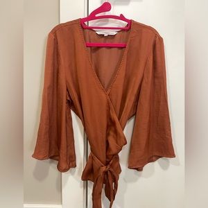 Burnt orange wrap around shirt. Mid century modern